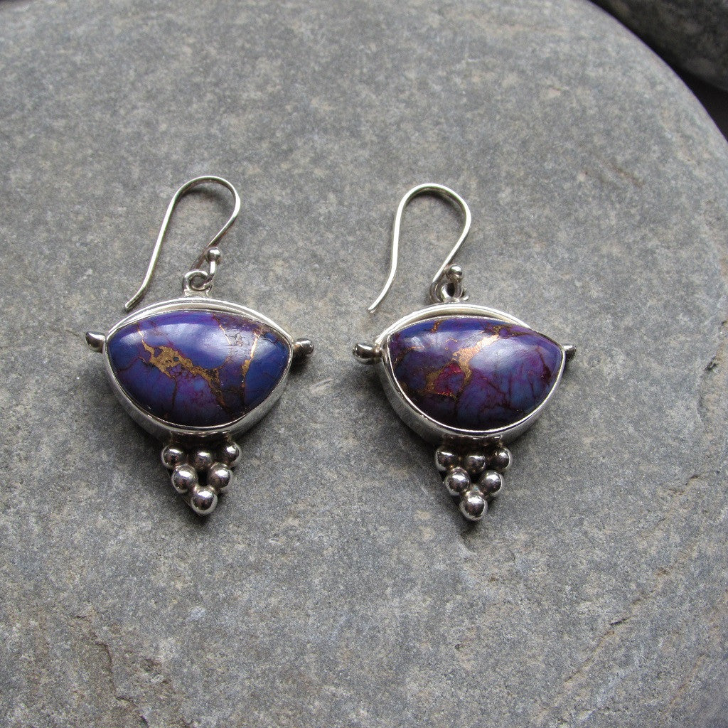 Sterling Silver Purple Copper Turquoise Earrings feature a generous size half moon shaped cut Purple Copper Turquoise gemstone finished with silver honeycomb motif